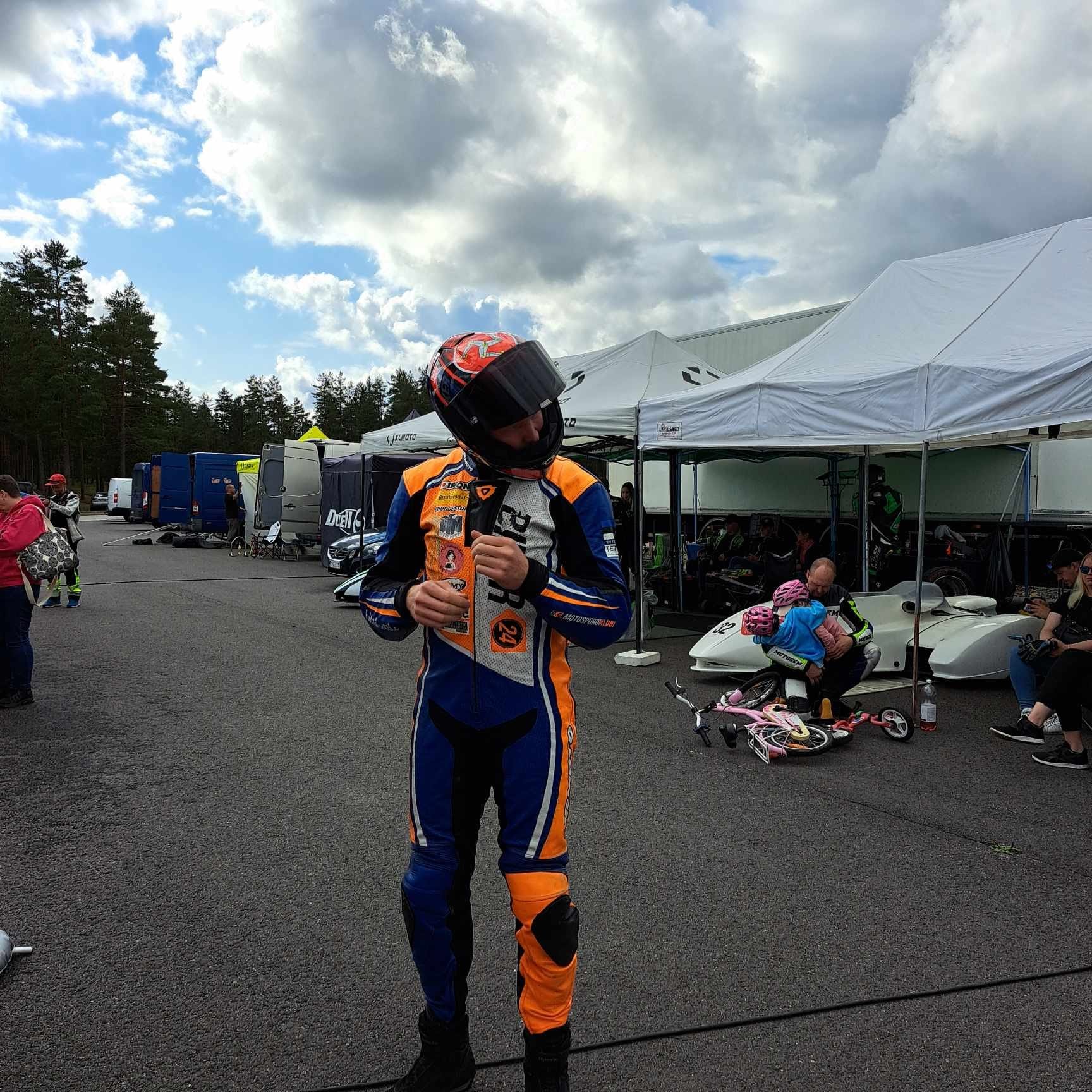 NFmoto riders and team together at the track