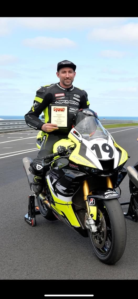 Rider portrait wearing a custom NFmoto leather suit